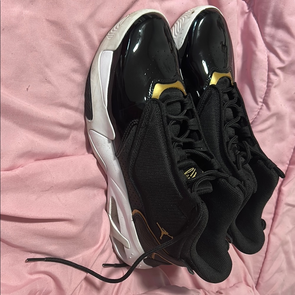 Jordan Black and Gold Sneakers